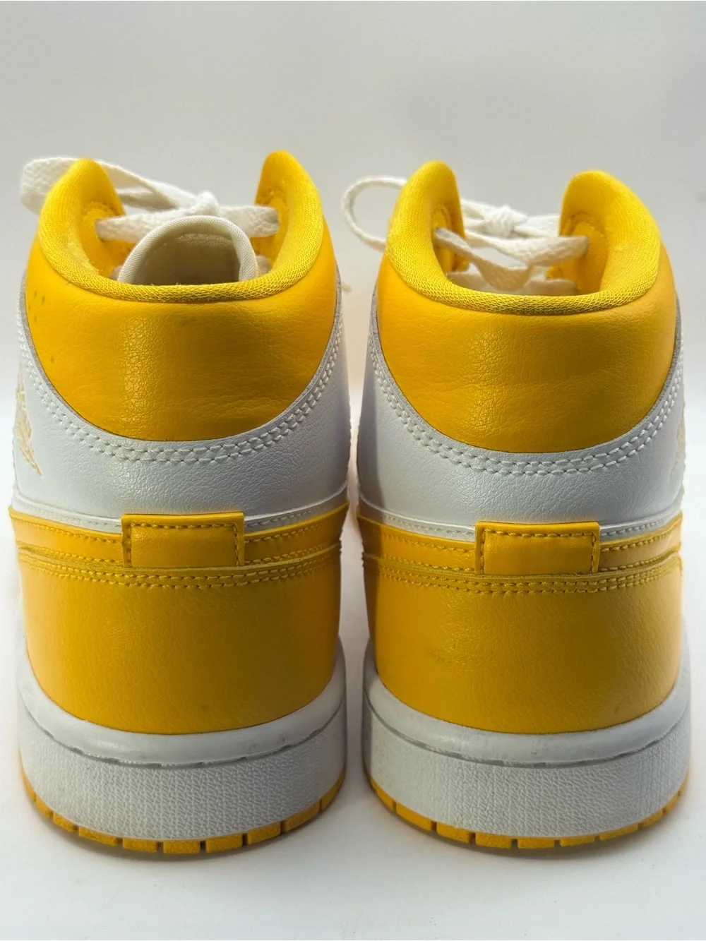 Nike Air Jordan Men’s 9 High Top Sneakers in Yellow and White